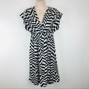 The magic of Stevie and Lindsay abstract checkered dress Alice n wonderland vibe